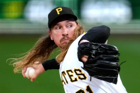 Cardinals halt Pirates' winning streak